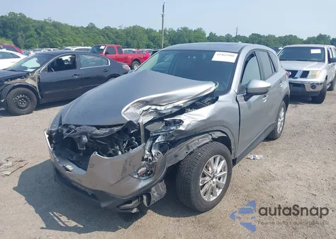 2014 Mazda Cx-5 Touring z USA, uszkodzony, nr VIN JM3KE2CY1E0425278